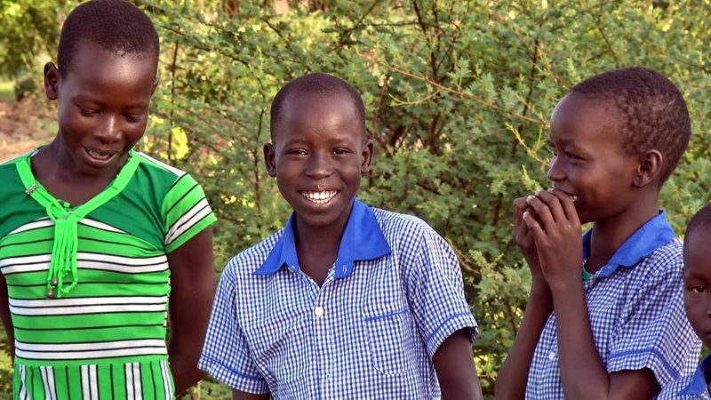 Two girls laughing at Timothy School, Mundari Bura, South Sudan