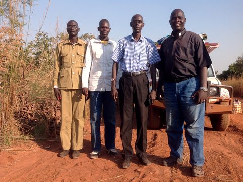 November 2015: Dr. Alex (second from right) goes to Tindilo with Pastor Philip, Jacob and the payam administrator to ask for land for the school