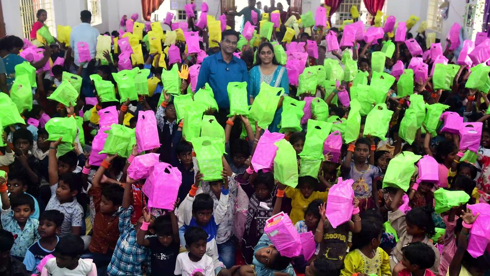 Children holding their gift bags at the end of VBS 2026